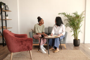 therapist during an individual counseling session with her female patient